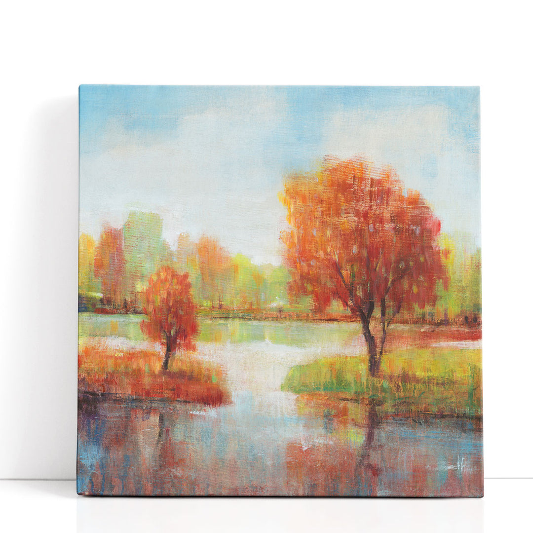 Orange tree canvas art with golden foliage by the lake