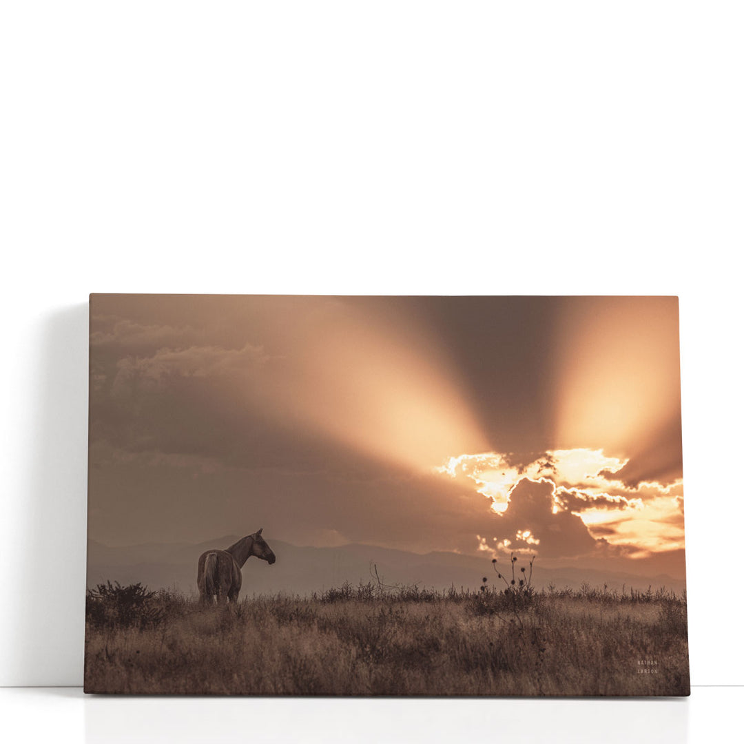 Faded sunset wall art with warm glow