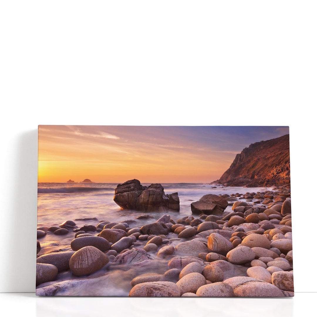 The Rocky Beach Of Porth Nanven, England During Sunset - Canvas Print Wall Art