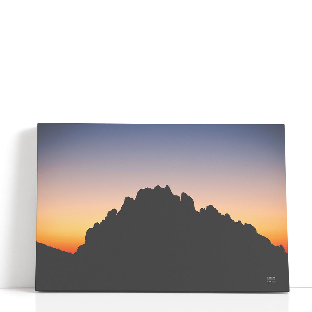 Mountain canvas wall art with sunset over peaks