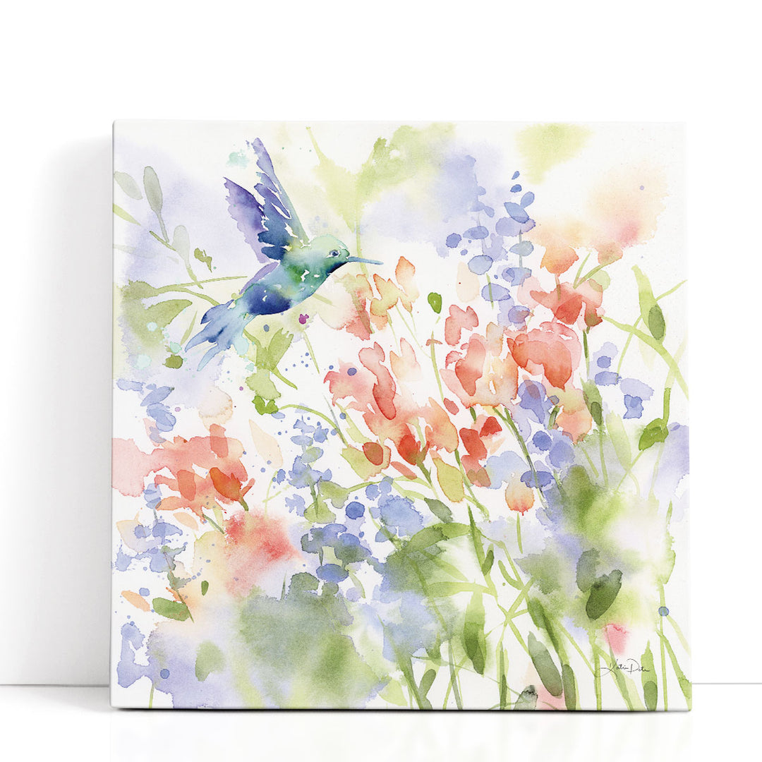 Blue hummingbird on floral branch