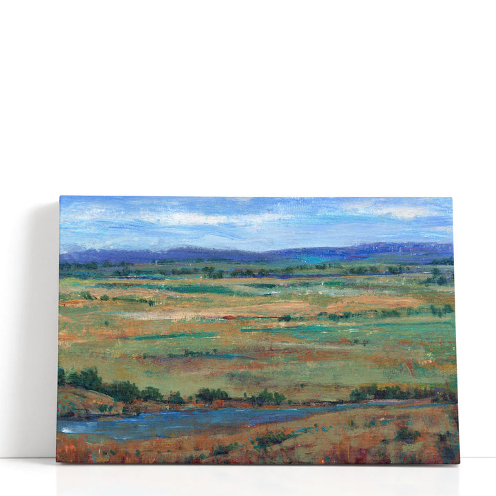 Landscape wall art with blue and green hues