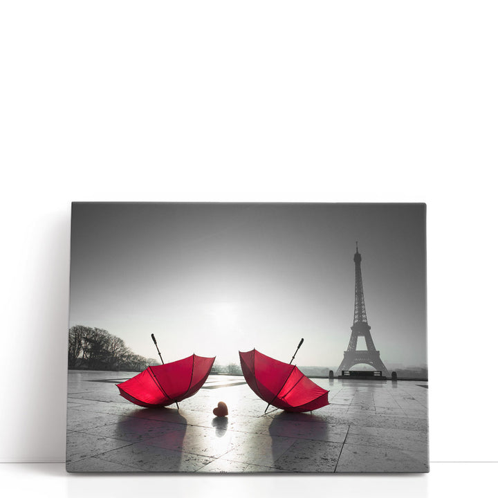 Two Umbrellas next to the Eiffel Tower - Canvas Print Wall Art