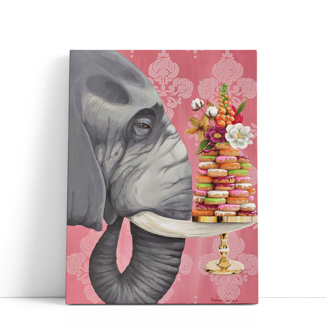 Elephant balancing donuts on tray