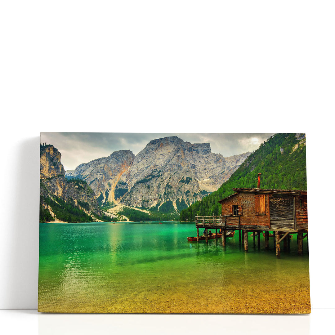 Brown beach hut canvas with calm lake and mountains