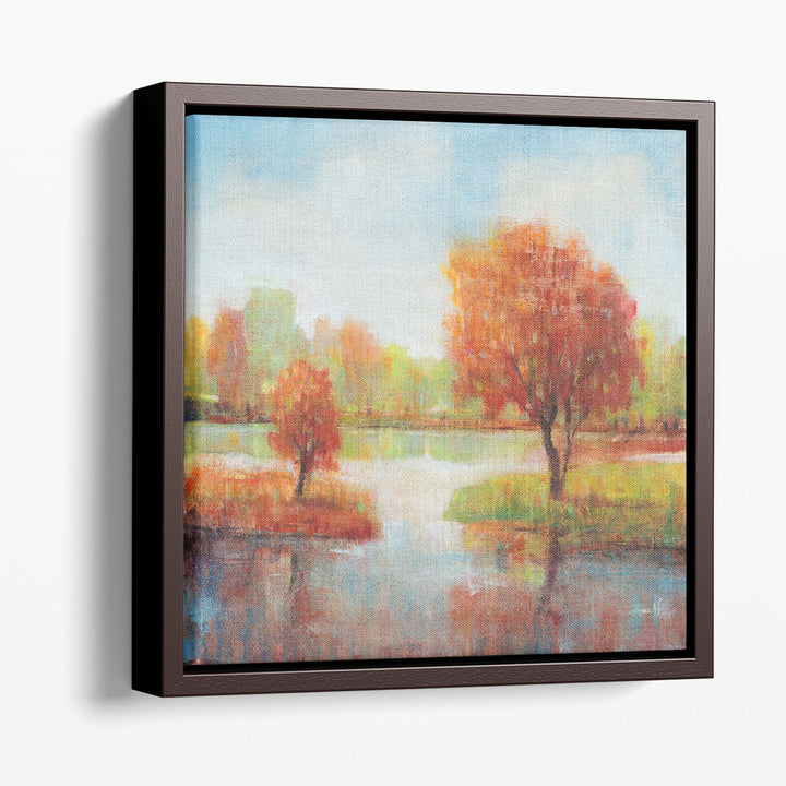 Lake wall art with calm blue water and autumn trees