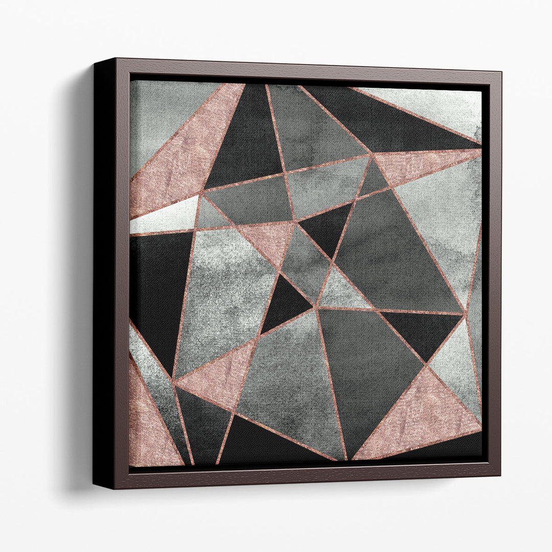 Geometric wall decor in blush and grey