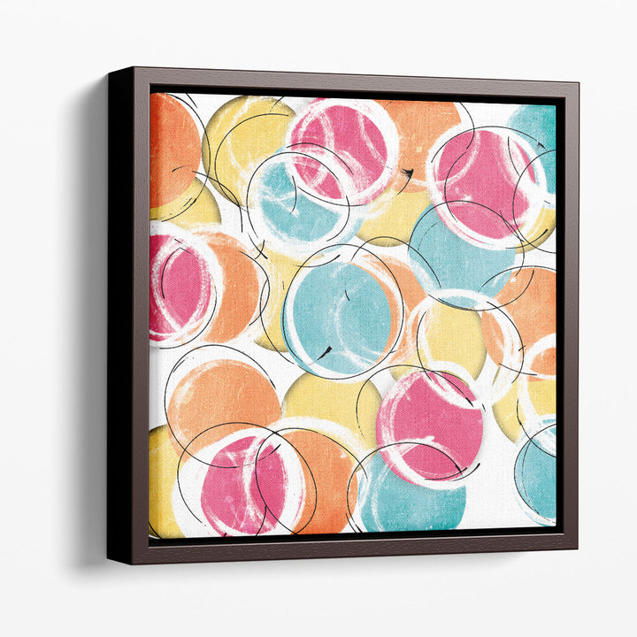 Geometric wall decor in pink, blue, and yellow