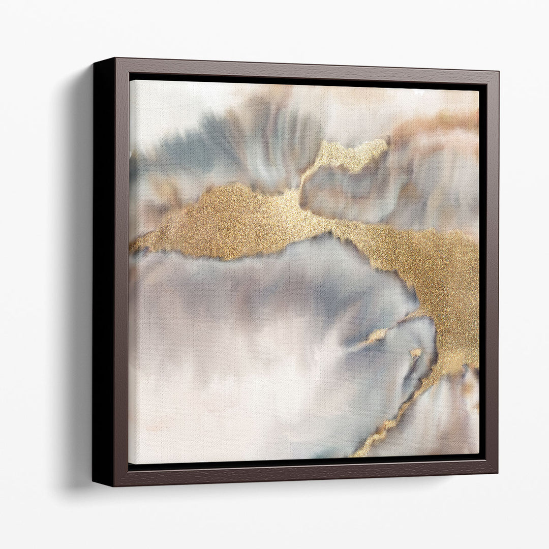 Abstract prints in gold, grey, and neutral tones