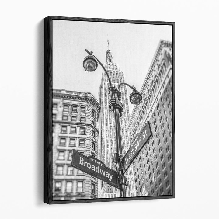 Street Lamp And Signs With Empire State Building, New York 2 Black And White - Canvas Print Wall Art