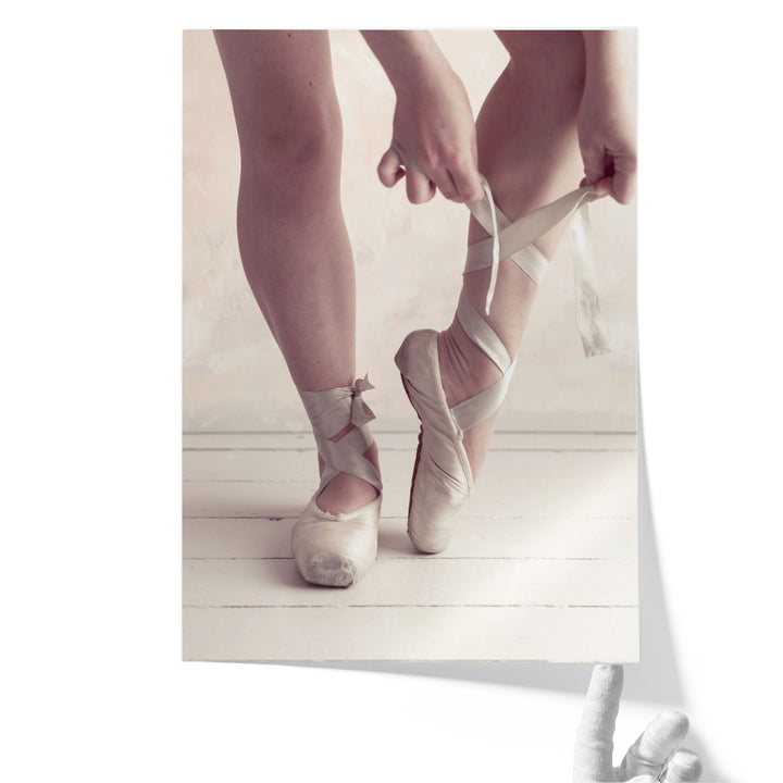 Close-up Of A Ballerina Putting On Ballet Slippers - Canvas Print Wall Art