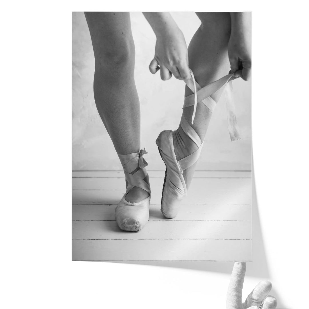 Close-up Of A Ballerina Putting On Ballet Slippers Black And White - Canvas Print Wall Art