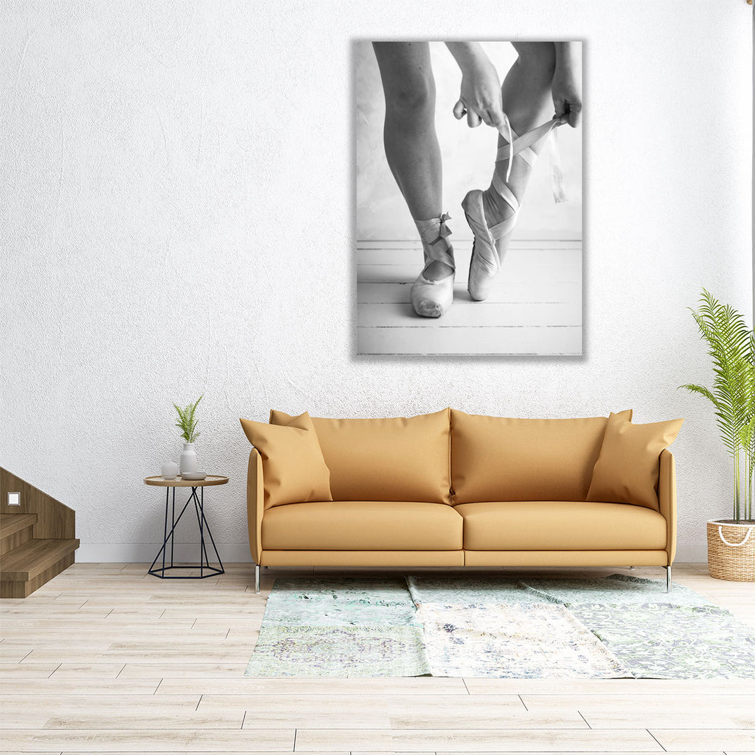 Close-up Of A Ballerina Putting On Ballet Slippers Black And White - Canvas Print Wall Art