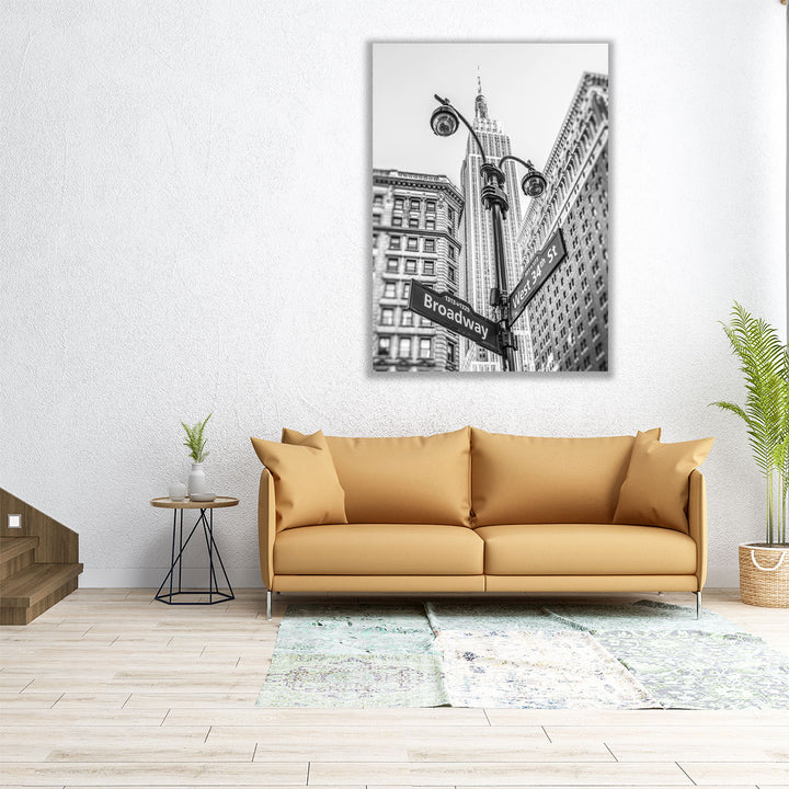 Street Lamp And Signs With Empire State Building, New York 2 Black And White - Canvas Print Wall Art