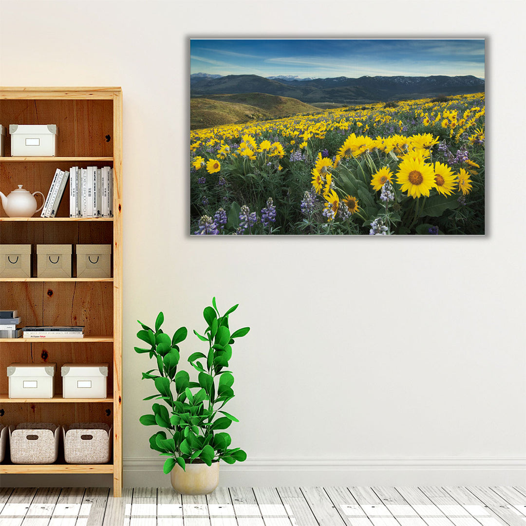Bedroom wall art with yellow, blue, and green natural elements