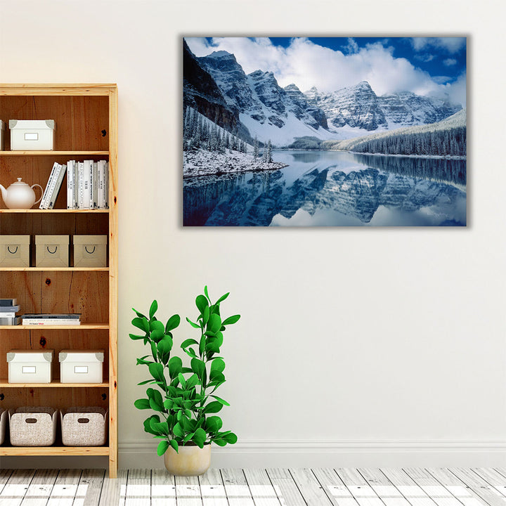 Blue and neutral wall art with lake and mountain scene