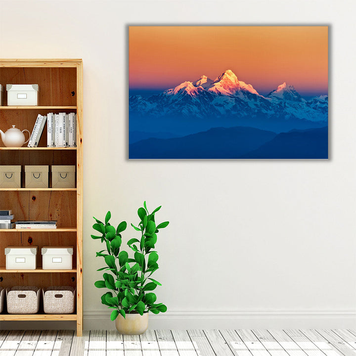 Blue and orange sky over mountains