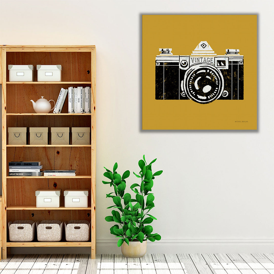 Mustard yellow canvas art in living room