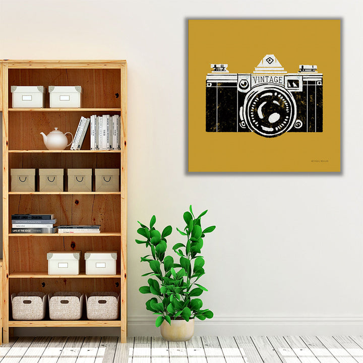 Mustard yellow canvas art in living room