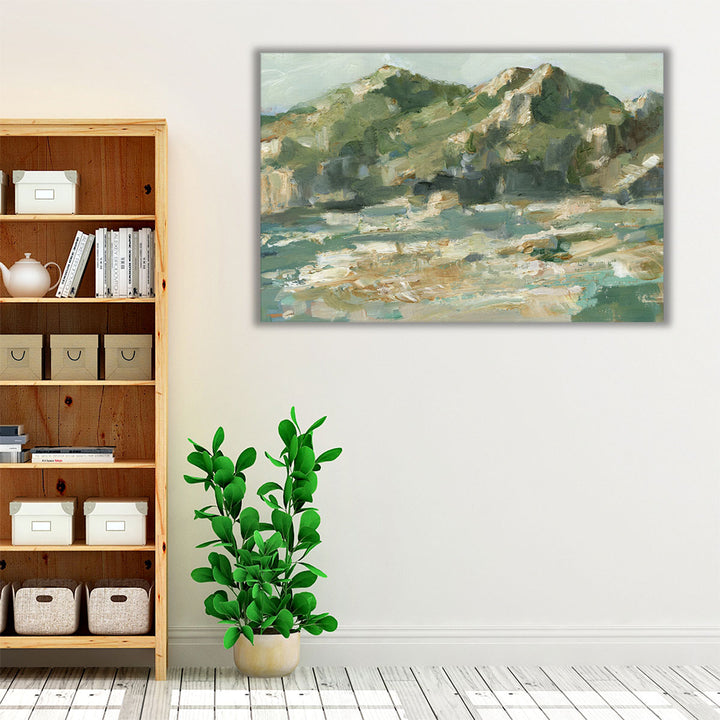 Neutral and green wall art with scenic mountain scene