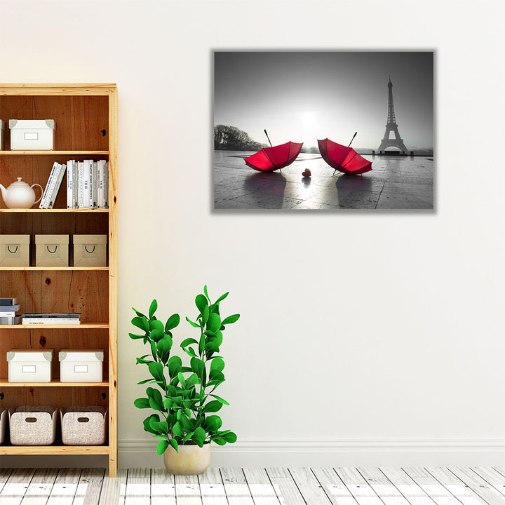 Two Umbrellas next to the Eiffel Tower - Canvas Print Wall Art