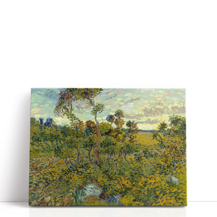 Green tree artwork with glowing sunset backdrop
