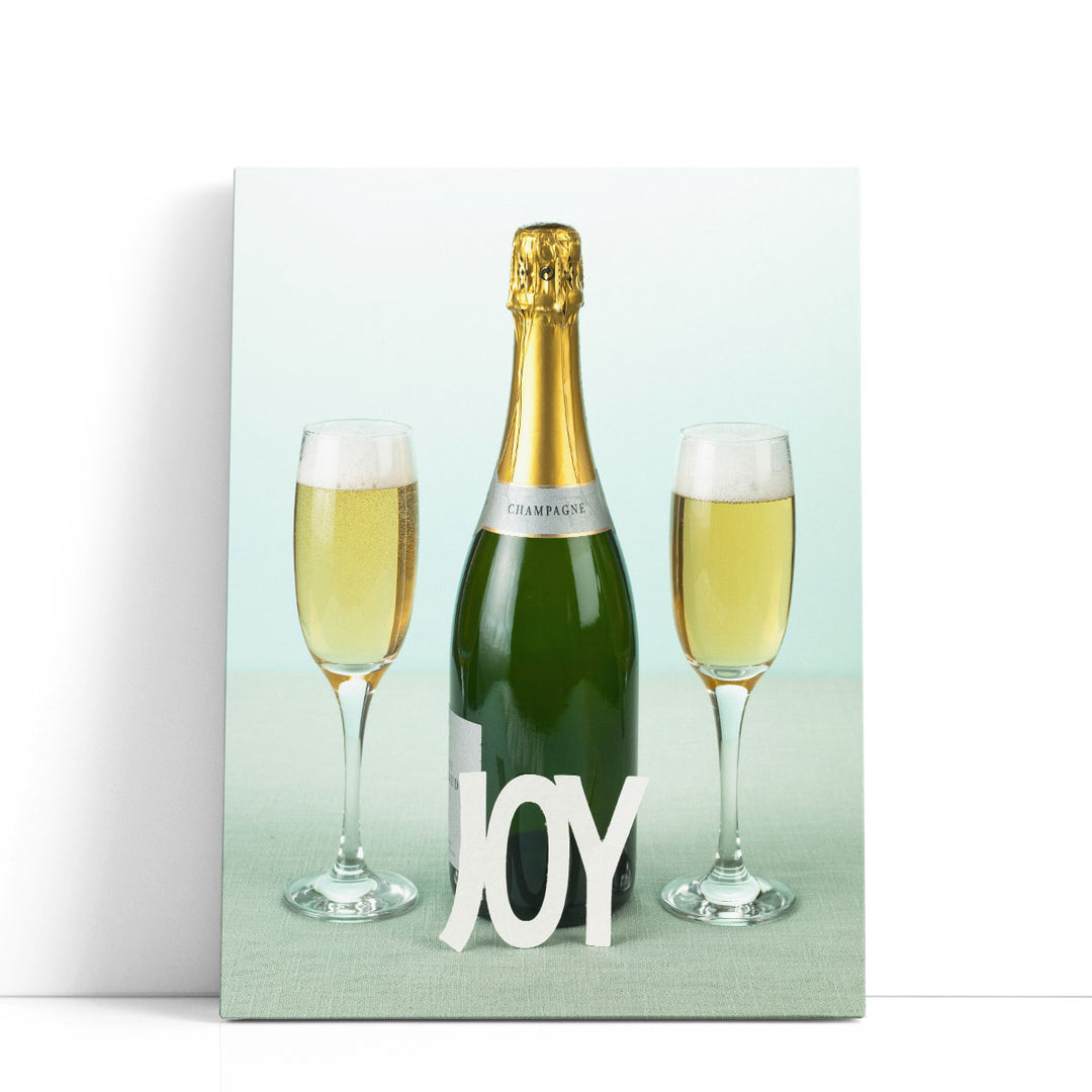 Champagne Bottle And Glasses With The Letters Joy - Canvas Print Wall Art