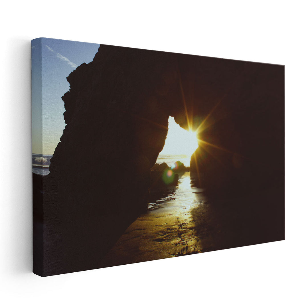 Sunset Through a Big Rock at El Matador Beach - Canvas Print Wall Art