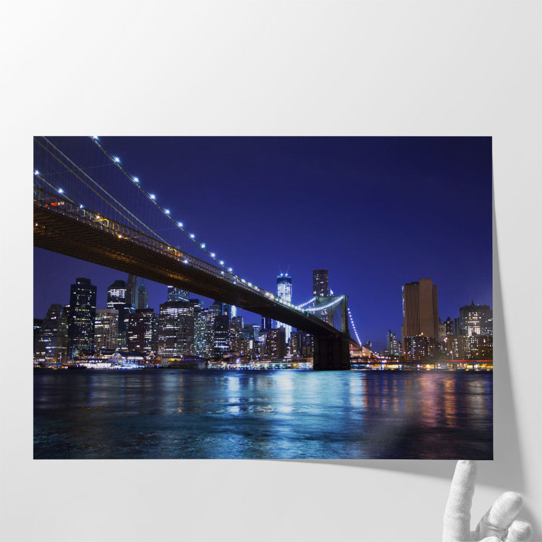 Manhattan and The Brooklyn Bridge At Night - Canvas Print Wall Art