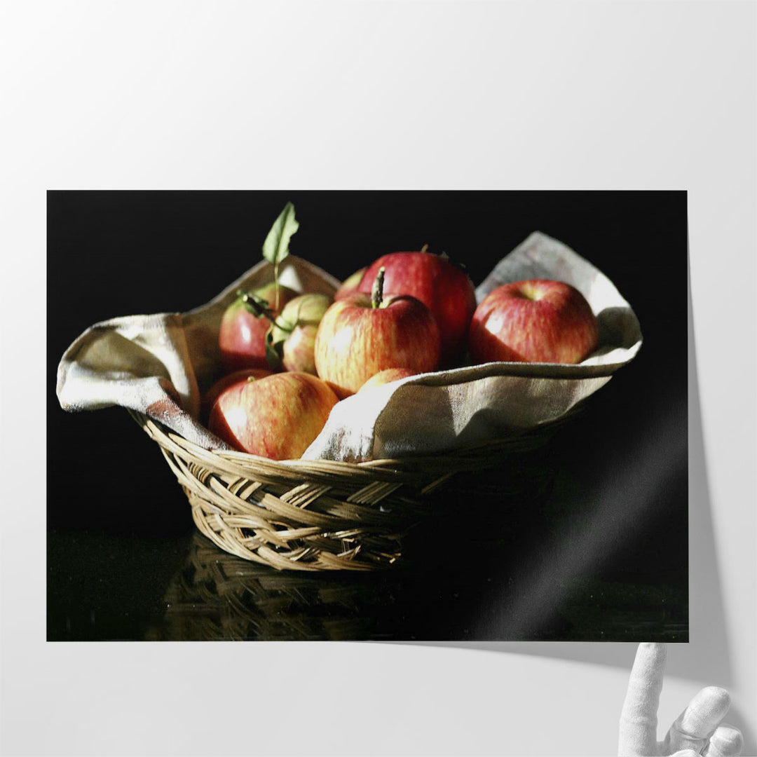 Glossy red apples on black backdrop