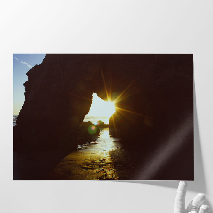 Sunset Through a Big Rock at El Matador Beach - Canvas Print Wall Art