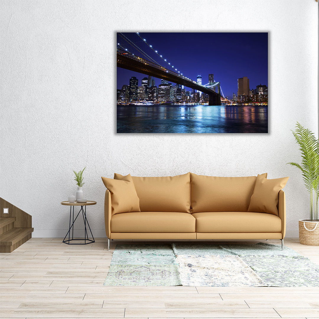 Manhattan and The Brooklyn Bridge At Night - Canvas Print Wall Art