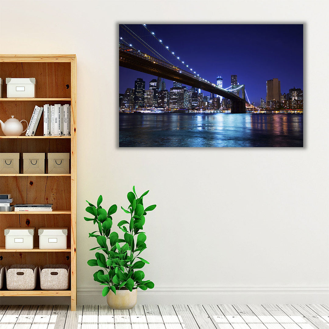 Manhattan and The Brooklyn Bridge At Night - Canvas Print Wall Art