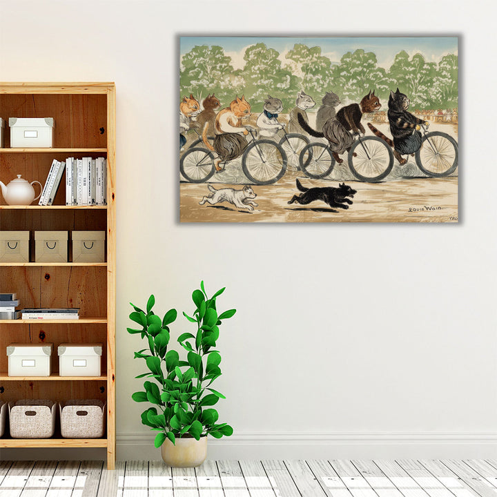 A Group of Cats Engaged in a Cycle Race in Hyde Park - Canvas Print Wall Art