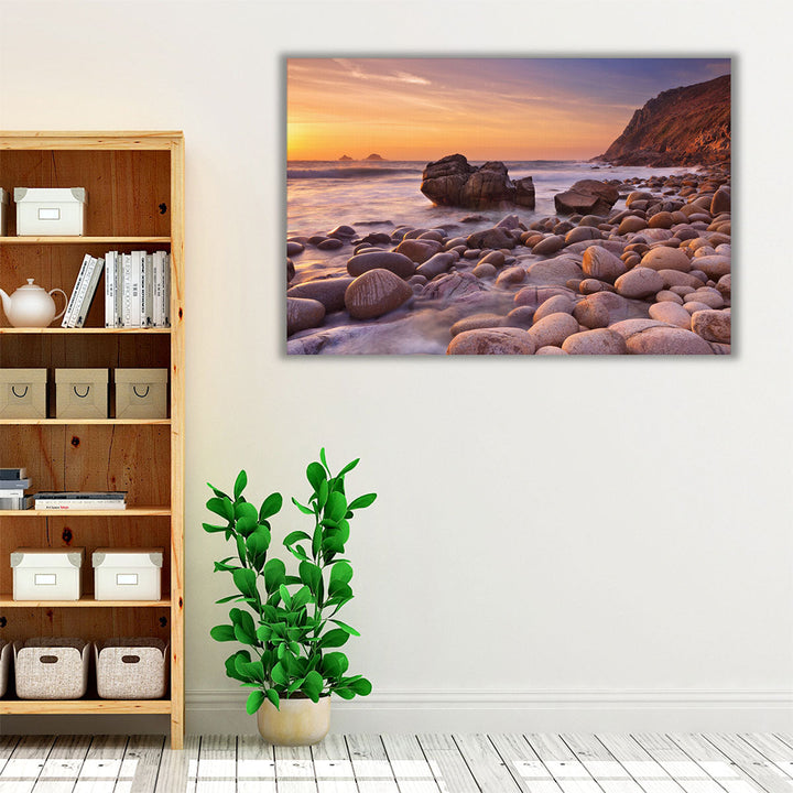 The Rocky Beach Of Porth Nanven, England During Sunset - Canvas Print Wall Art