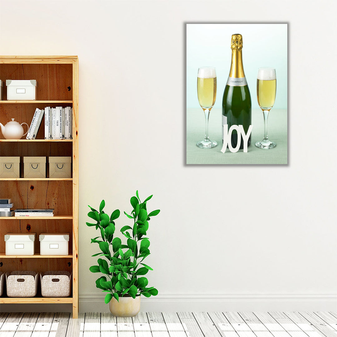 Champagne Bottle And Glasses With The Letters Joy - Canvas Print Wall Art