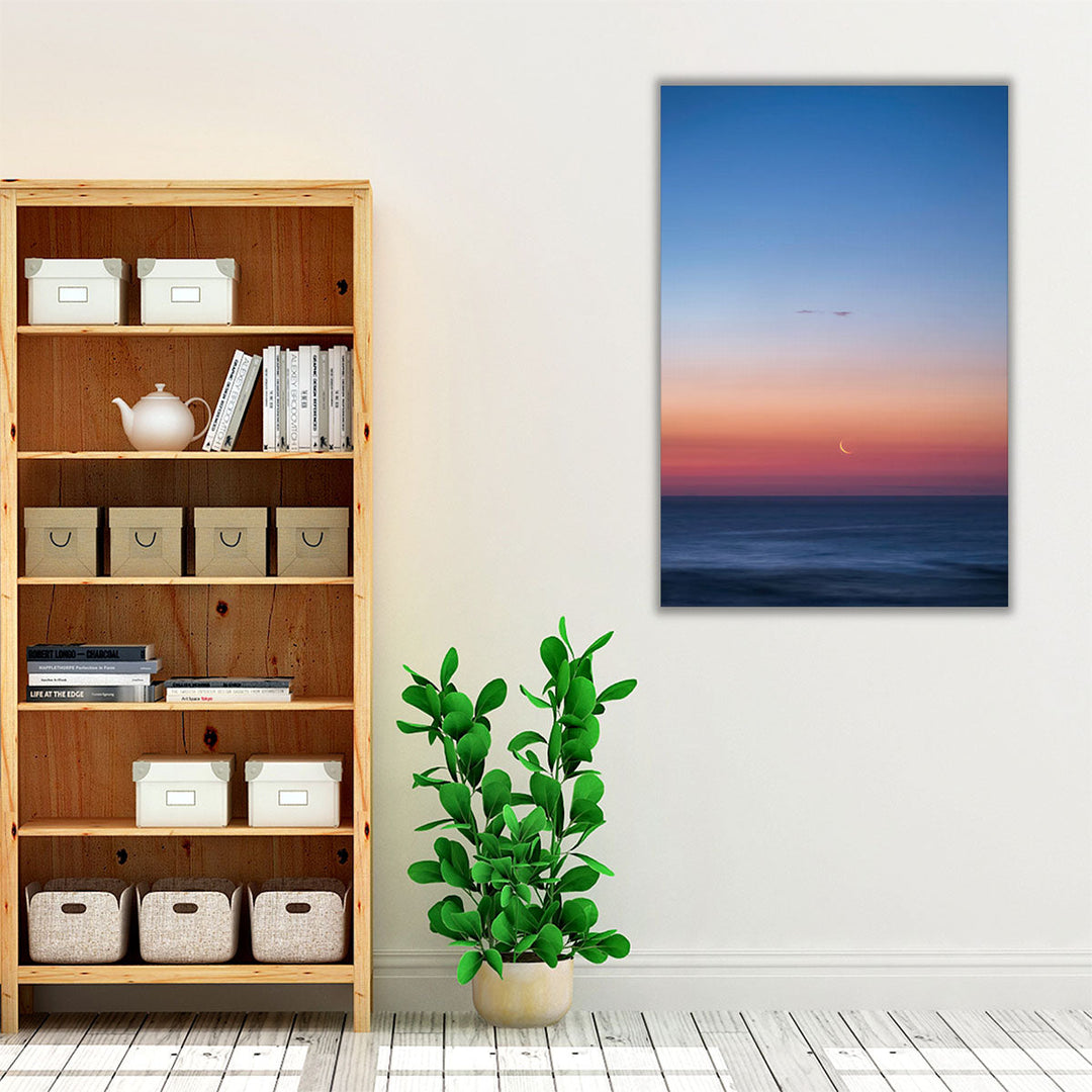 Fingernail Moon Setting Over Ocean During Sunset - Canvas Print Wall Art